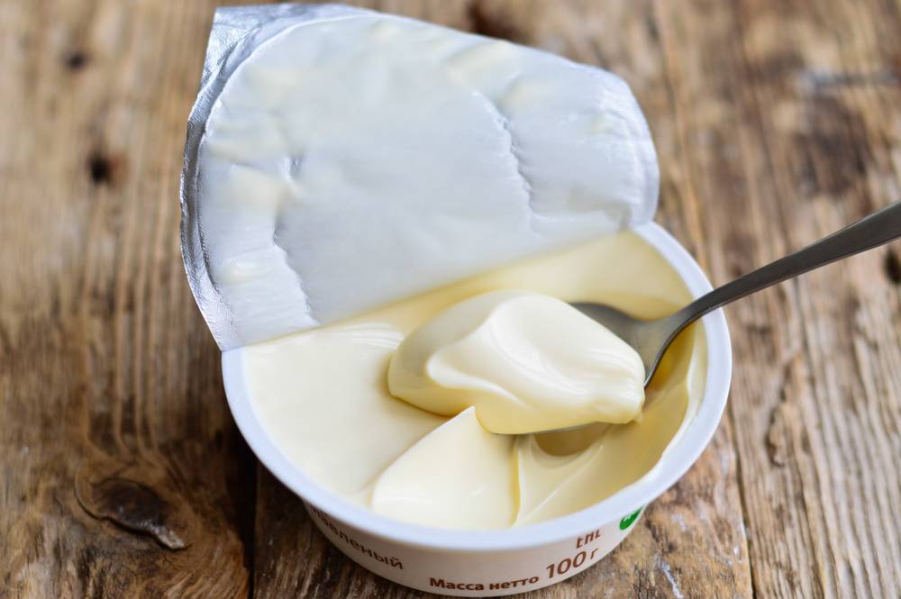 Полезные свойства и вред копченого сыра